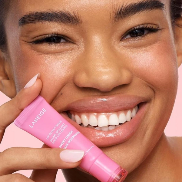 Бальзам-блеск для губ с ароматом конфеты Laneige Lip Glowy Balm #Sweet Candy 12978 фото